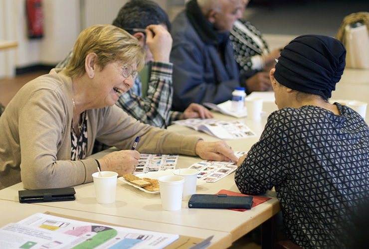 Deelnemers tijdens een workshop over bankzaken